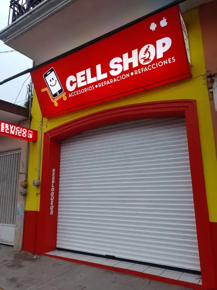Anuncio luminoso con lona backlight y recorte de vinil para Cell Shop